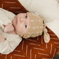 Light Mustard Strokes Newborn Knot Hat
