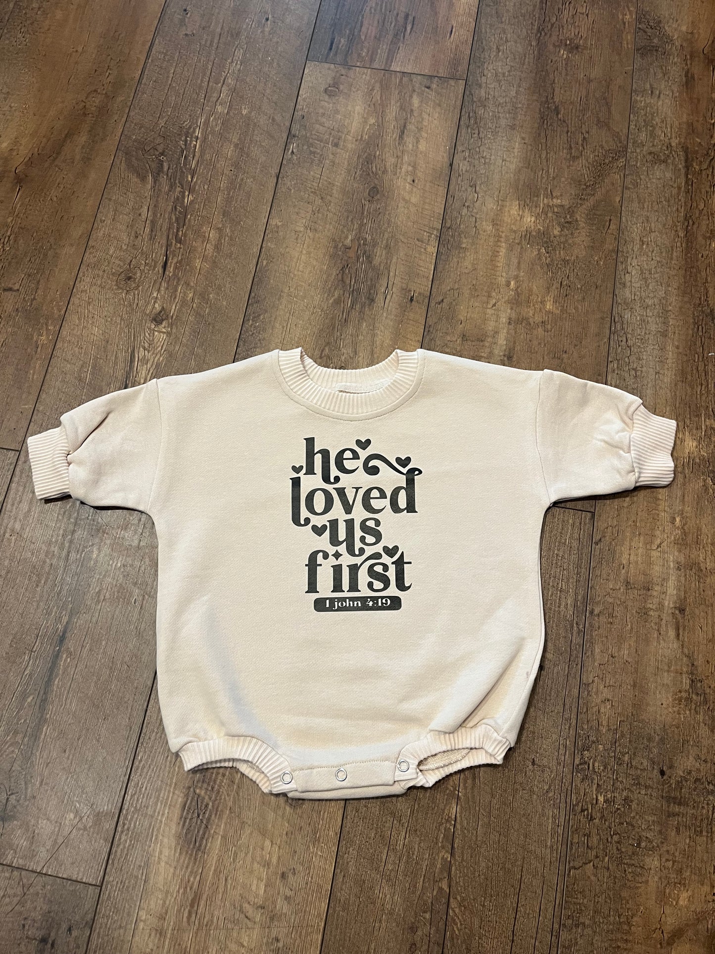 He loved us first onesie