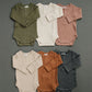 Dusty Rose Organic Snap Long Sleeve Ribbed Bodysuit